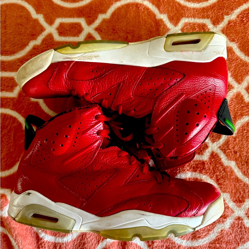 Red, White, and green Jordan retro 6's.
